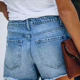 Asymmetriske denim shorts – Råt design med trendy overlap