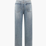 Crossover jeans med asymmetrisk lukning – Statement denim med edgy twist