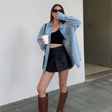 Oversized denimskjorte med lommer og knapper
