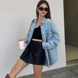 Oversized denimskjorte med lommer og knapper