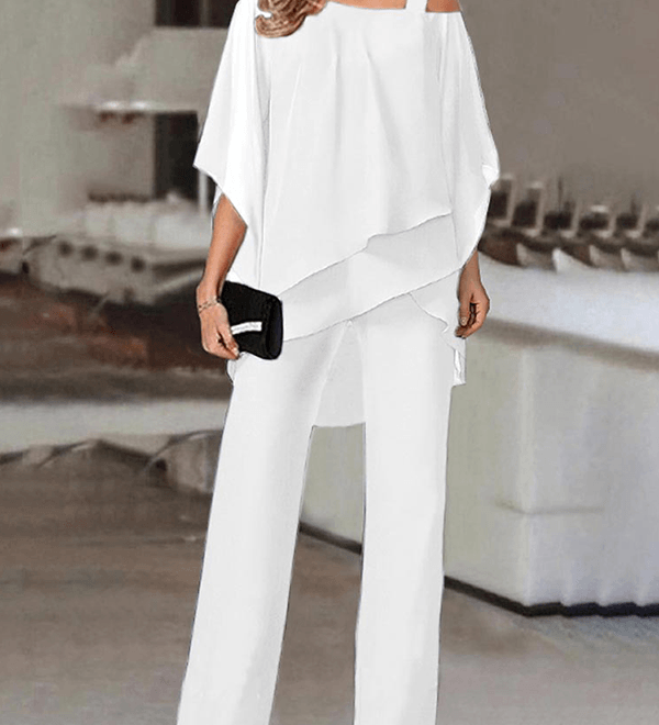 Elegant to-delt buksedragt med asymmetrisk chiffon-top