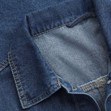 Denimjakke med bælte og knaplukning