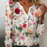 Bluse med blomsterprint og V-udskæring
